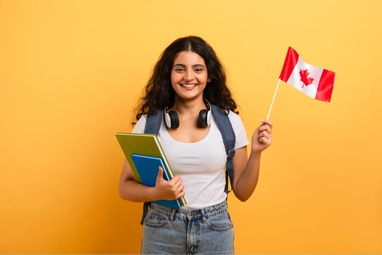 Intercâmbio em Vancouver, onde apresenta uma garota segurando a bandeira do canadá